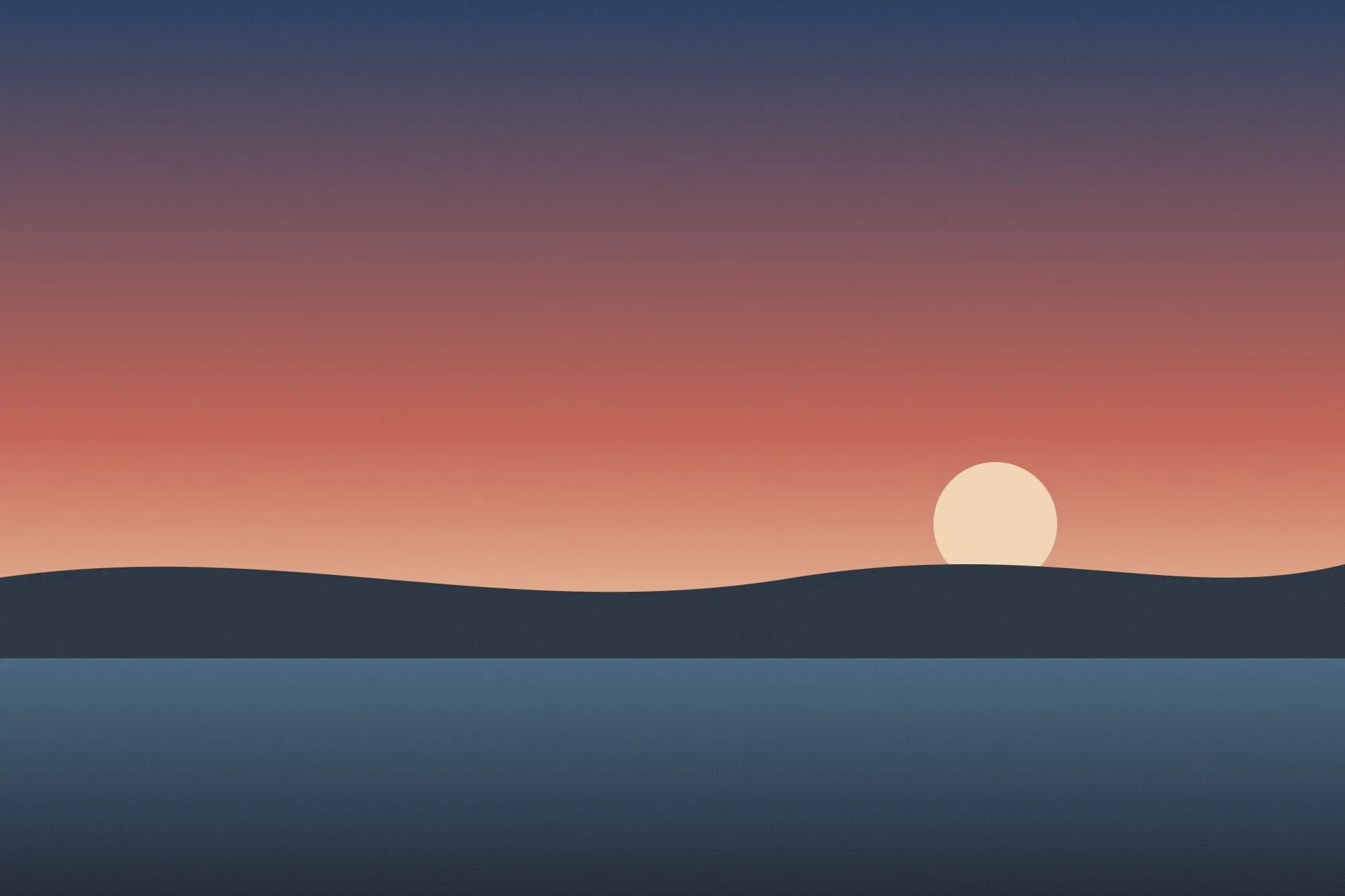 A pale coast under a wide sky